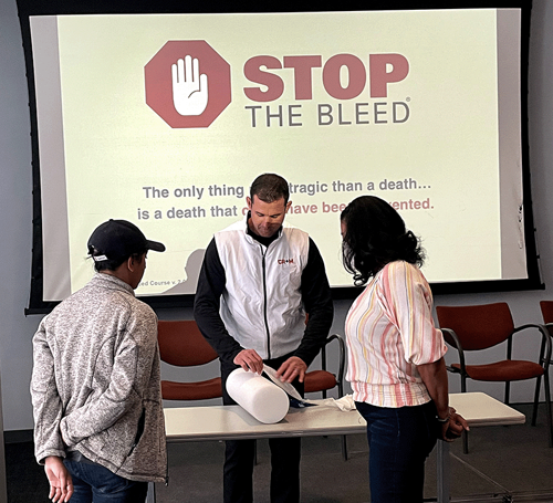 CRM instructors demonstrate wound packing techniques to participants at the CUNY Graduate School of Journalism during a recent STOP THE BLEED® course.