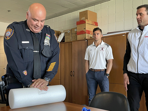 A law enforcement participant practices compression skills during a STOP THE BLEED® course taught by CRM at Stevens Institute of Technology.